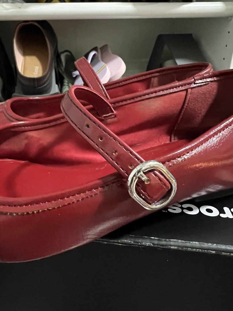 Stradivarius Red Mary Jane Flats Size 38 (Category: Flats & Sandals) located in Paranaque City. Submitted by guevssss (Listing ID 1466207291, Image 3). Description: - Well used but stored properly - Brand: Stradivarius - Style: Glossy Red Mary Jane flats with square toe and buckled strap - Size: EUR 38 - Condition: Light wear on the bottom rubber grip .
