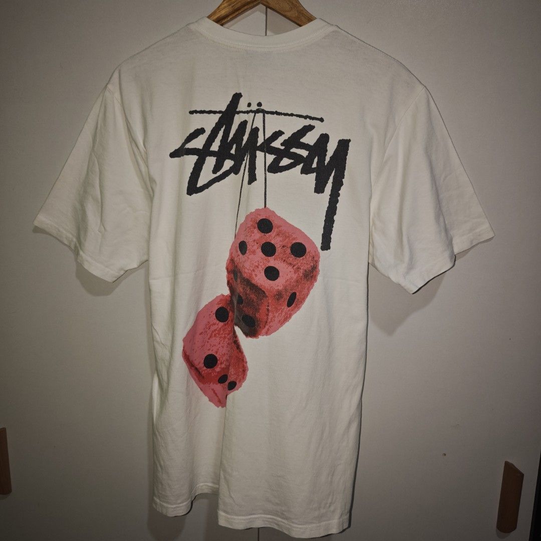 Stüssy Dice Graphic Tee White Size M (Category: Tshirts & Polo Shirts ) located in Caloocan City. Submitted by thebrokebean_mla (Listing ID 1466334452, Image 1). Description: NIKE POLO Stussy Dice Size: Large - Xlarge Width: 21 Length: 29 Color/Color rate: WHITE 9.5/10 Condition: Excellent Presentable Issue: none Mode of payment:GCASH, BANK TRANSFER 📌Color may vary due to lighting📸 📦 Shipping via JNT EXPRESS🚚 📍Location: Caloocan, Metro Manil