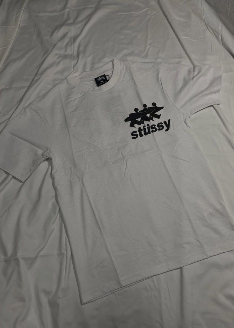 Stüssy White Graphic Tee (Category: Tshirts & Polo Shirts ) located in Manila. Submitted by caliii1 (Listing ID 1466295591, Image 3). Description: Stüssy White - 280-300 gsm - premium quality - individual ziplock and complete tags.