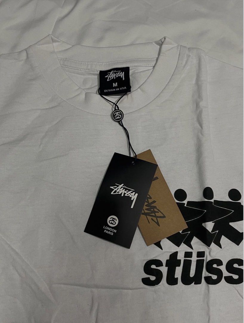 Stüssy White Graphic Tee (Category: Tshirts & Polo Shirts ) located in Manila. Submitted by caliii1 (Listing ID 1466295591, Image 2). Description: Stüssy White - 280-300 gsm - premium quality - individual ziplock and complete tags.