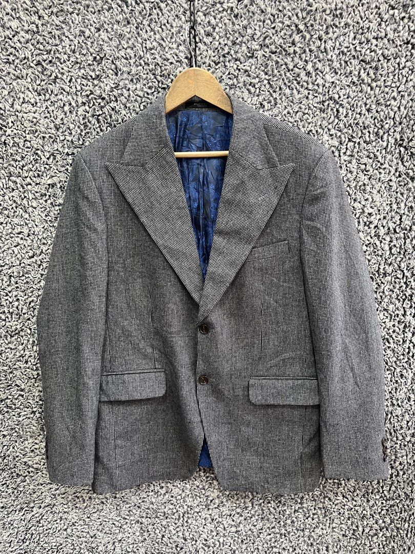 StudioSuits custom blazer | Size L (Category: Coats, Jackets and Outerwear) located in General Trias. Submitted by zrchustle.604 (Listing ID 1466168934, Image 1). Description: StudioSuits custom blazer features a striking black and white micro-houndstooth pattern paired with a vibrant, patterned blue silk/viscose interior lining. The design is heavily inspired by 1970s sartorial aesthetics, characterized by its distinctive wide peak lapels, a tap