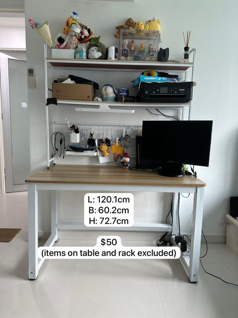 study table (Category: Tables & Sets) located in Singapore. Submitted by iwtshuijiao (Listing ID 1466307405, Image 1). Description: dimensions: 120.1cm (L) x 60.2cm (B) x 72.7cm (H) accessories and items shown not included self collect by 15th Oct.
