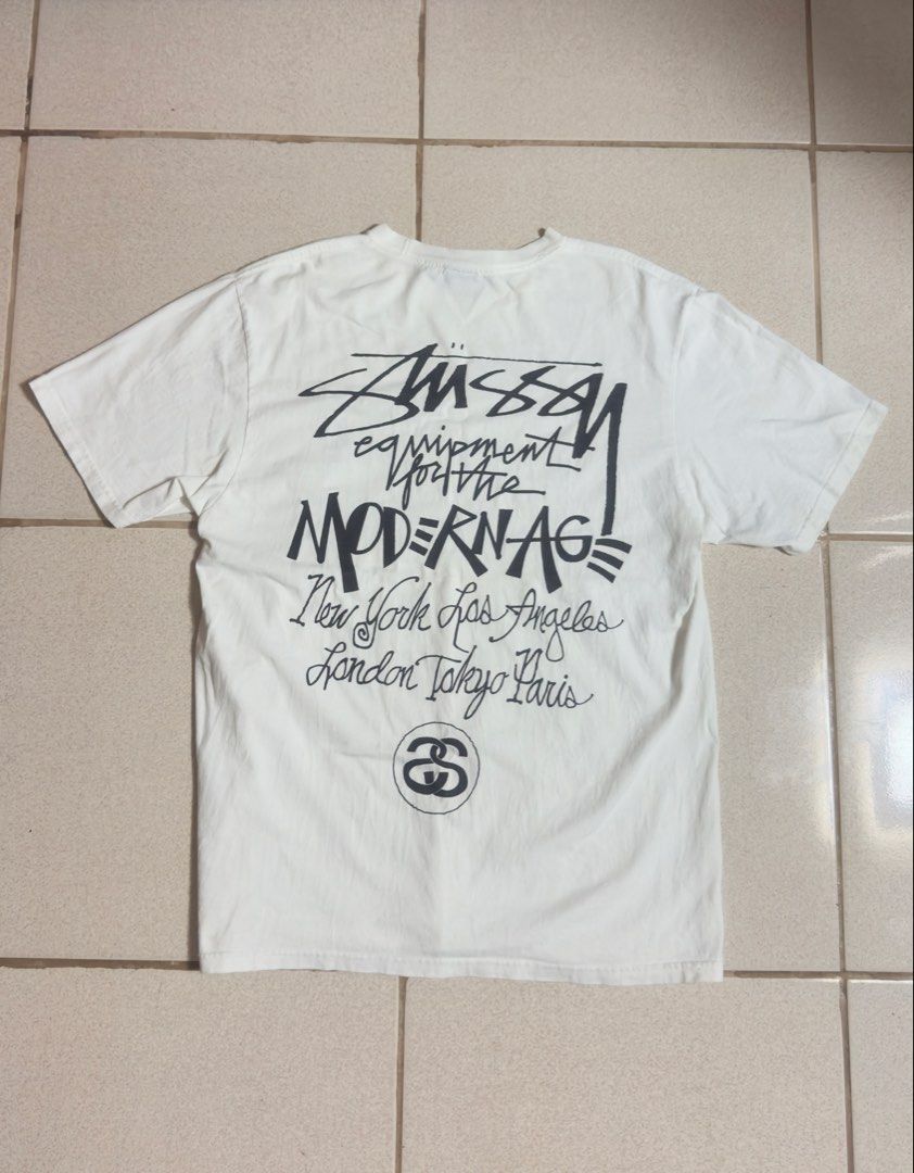 Stussy Modern Age Tee (Category: Tshirts & Polo Shirts ) located in Leyte. Submitted by zyy_thrift (Listing ID 1466233489, Image 2). Description: Stussy Modern Age Tee 21x28 Good Condition Color Rate: 10/10 Issue: ❌ (need wash na stock lang sa house) LOC: Tacloban City📍.