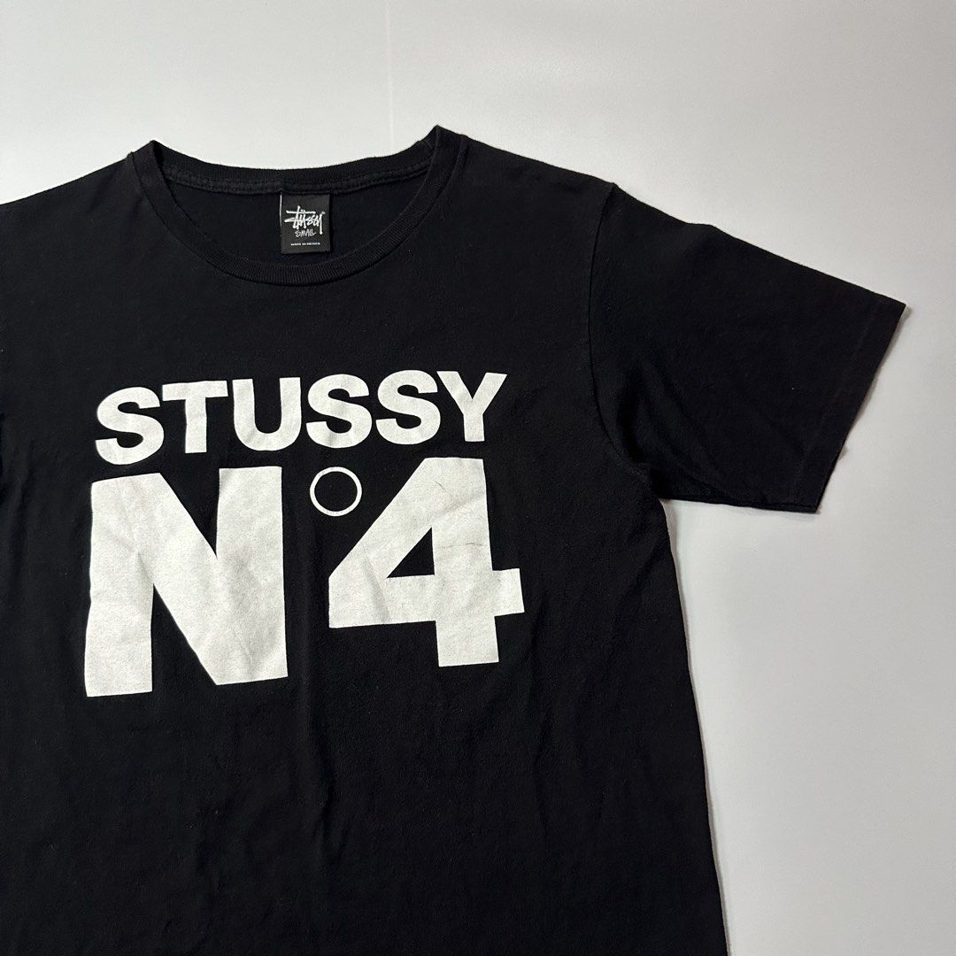 Stussy Nº4 Logo black tee (Category: Activewear) located in Dagupan City. Submitted by unknownlootph (Listing ID 1466326377, Image 2). Description: Size: Small (18x26) Condition: 9/10 Color rate: 9/10 Issue: unnoticeable hairline crackprints (Legit/Authentic).