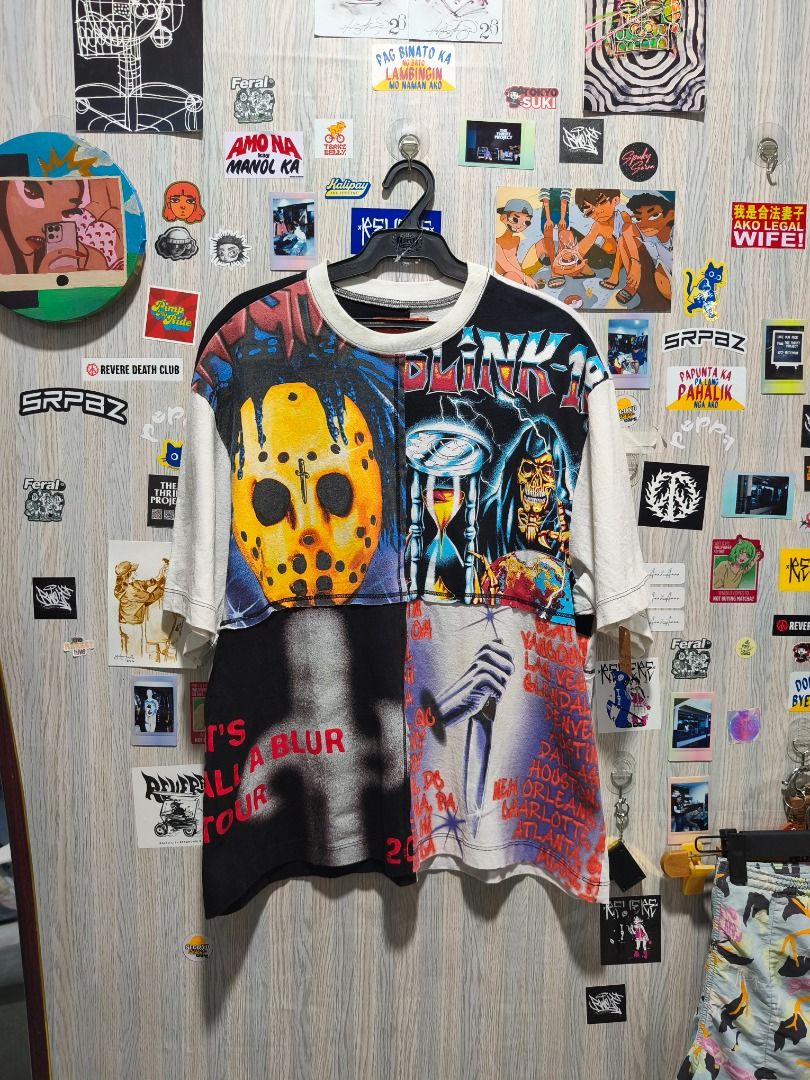 SUAY Upcycled Patchwork Graphic Tee 1/1 (Category: Tshirts & Polo Shirts ) located in Davao. Submitted by thethriftproject082 (Listing ID 1466304154, Image 1). Description: - Brand/Model: SUAY Patchwork Short Sleeve T-Shirt - Design: Multicolor panels with bold graphic prints including Jason Voorhees hockey mask, Blink-182 typography, and tour dates - Details: Ribbed collar, contrast stitching, and distinctive orange neck tag with yellow SUAY log