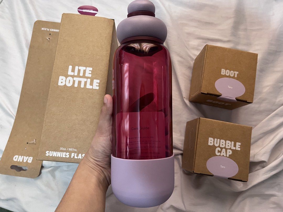 Sunnies Flask Lite Bottle 30oz Complete Set (Category: Water Bottles & Tumblers) located in Subic. Submitted by cyrelll (Listing ID 1466208306, Image 3). Description: INCLUSIONS: 🌼 Sunnies Lite 30oz Bottle - Hibiscus 🌼 Sunnies Flask Bubble Cup - Taro 🌼 Sunnies Flask Band 🌼Sunnies Boot - Taro - BRAND NEW w/ box - never been used - w/ FREE ENGRAVING with any sunnies branch store RFS: I have my own sunnies tumbler na.
