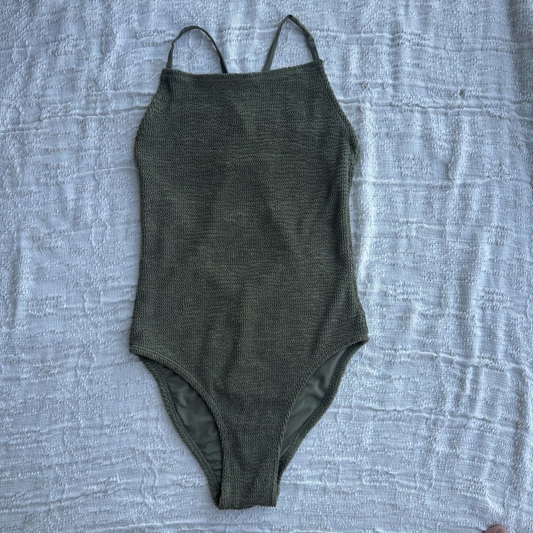 Swimsuit Primark Green Textured One Piece (Category: Bikinis & Swimsuits) located in Manila. Submitted by thriftclub.ph (Listing ID 1466286082, Image 2). Description: ▫️Decluttering (too many swimwear!) ◻️ Fits xs - s ⬜️ No pad slots (Used tapies) ⚪️ Adjustable straps ⬜️ Halter style - safe for surfing 😉.