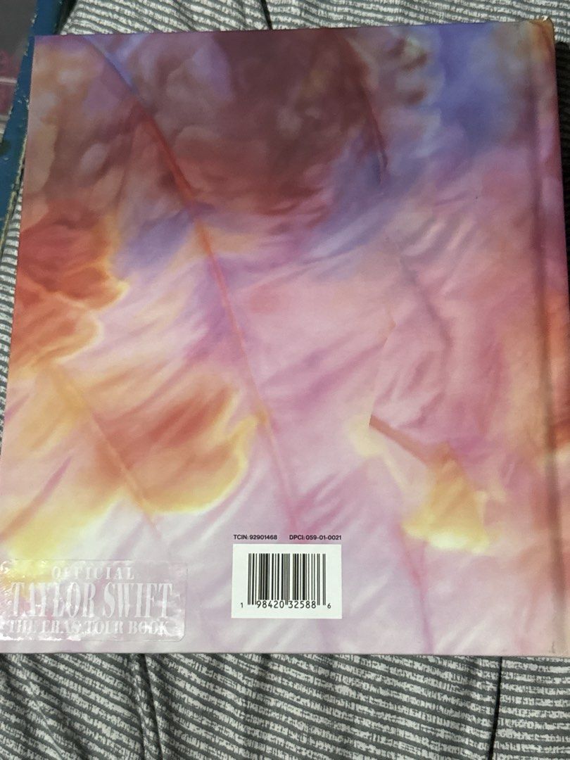 Taylor Swift The Eras Tour Book (Category: CDs & DVDs) located in Manila. Submitted by sayelolo18 (Listing ID 1466290663, Image 2). Description: - Official Taylor Swift The Eras Tour hardcover book - Includes photos and text directly from Taylor - Bought straight from the official drop - Excellent overall shape with clean pages and solid spine - Perfect addition for any Swiftie's collection.