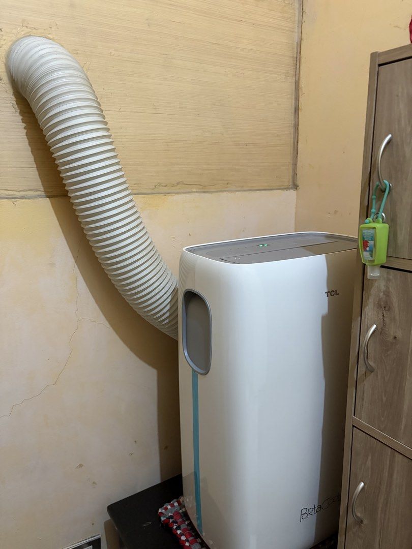TCL Portable Air Conditioner (Category: Air Conditioning and Heating) located in Taguig. Submitted by glesasanju73188 (Listing ID 1466156857, Image 3). Description: TCL Portable TAC 09CPA 1 HP Power Consumption 900 W Noise Level: 50–53 dB(A) (High/Med/Low) Dimensions: Approx. 31 cm x 42 cm x 68 cm Weight: Approx. 26 kg With box, remote, manual and warranty.