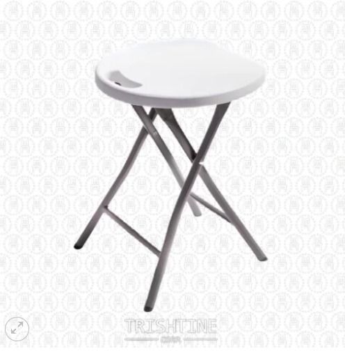 TFP-019 | Folding Stool (Category: Chairs) located in Caloocan City. Submitted by jim.trishtineofficefurnitures (Listing ID 1466235409, Image 1). Description: - Color: White plastic seat with grey metal cross legs - Design: Round, lightweight, and features a built-in handle cutout for easy carrying - Storage: Folds completely flat to fit behind doors or in narrow gaps - Versatile: Great extra seating for parties, balcony chilling, study desks, or