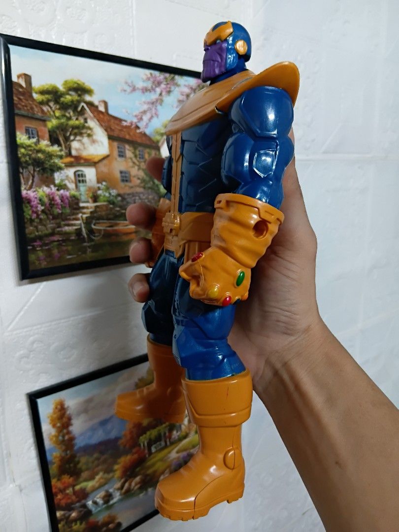 Thanos Basic Action Figure (Category: Figurines & Statues) located in Quezon City. Submitted by coffeeyuki56158 (Listing ID 1466189339, Image 2). Description: Thanos Basic Action Figure authentic hasbro and around 9.5 inches ang taas nya , very presentable pa po parang bago pa , good for add up display sa collection , good for marvel toy collectors check all photos po thanks qc areas meet ups.