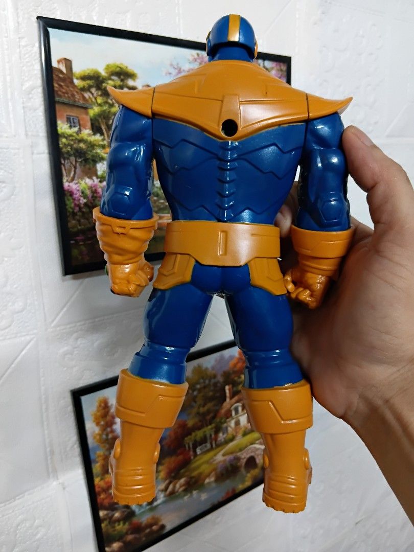 Thanos Basic Action Figure (Category: Figurines & Statues) located in Quezon City. Submitted by coffeeyuki56158 (Listing ID 1466189339, Image 3). Description: Thanos Basic Action Figure authentic hasbro and around 9.5 inches ang taas nya , very presentable pa po parang bago pa , good for add up display sa collection , good for marvel toy collectors check all photos po thanks qc areas meet ups.