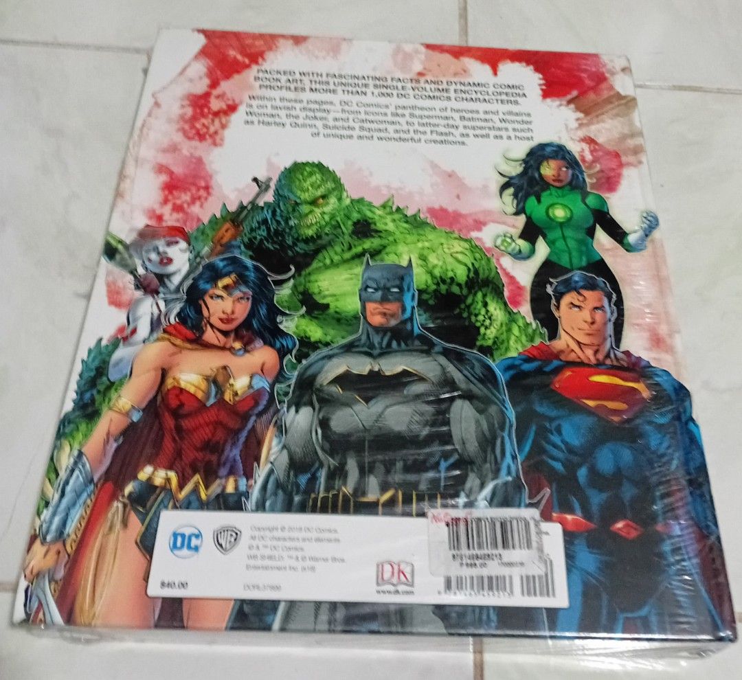 The DC Comics Encyclopedia: The Definitive Guide to the Characters (Category: Comics & Manga) located in Manila. Submitted by luckyfox-3a3e (Listing ID 1466312552, Image 2). Description: - Brand new and still wrapped in original plastic - Massive hardcover guide featuring over 1,000 DC Comics characters - Includes detailed profiles, art, and fascinating facts on Superman, Batman, Wonder Woman, and more - Perfect reference book for comic book fans
