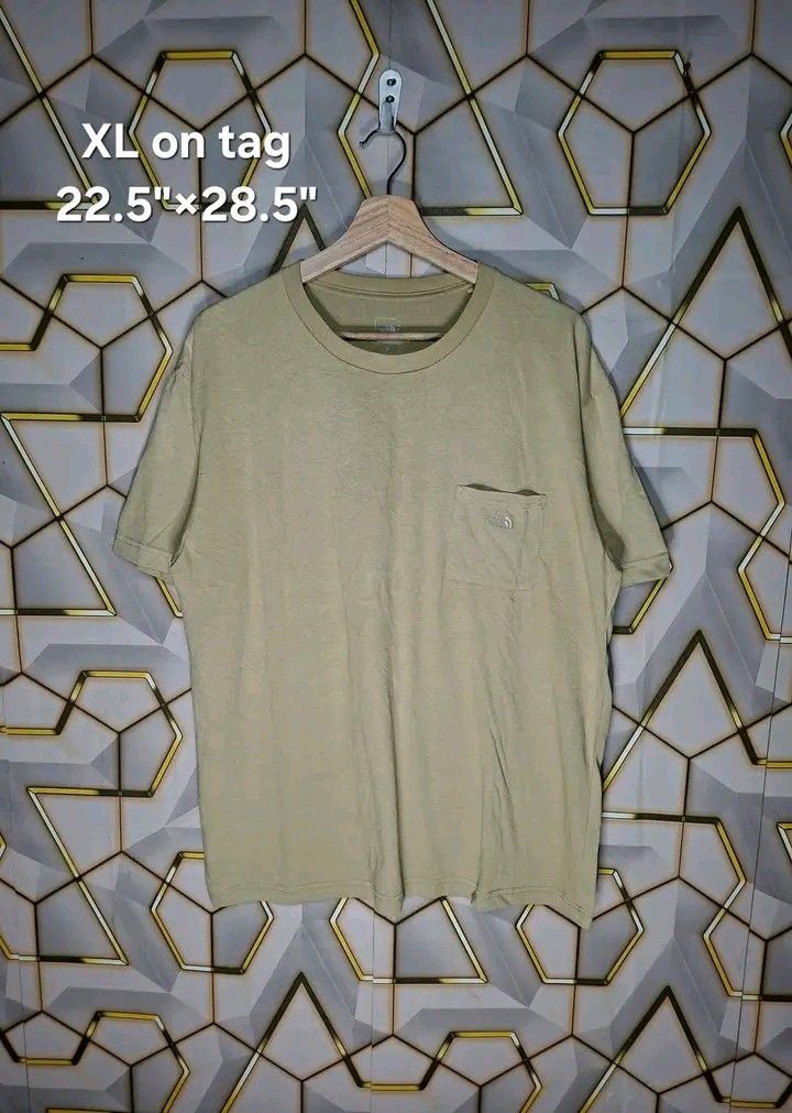 The north face pocket tee embroidery logo (Category: Tshirts & Polo Shirts ) located in Tagaytay City. Submitted by joyjavier1230 (Listing ID 1466297572, Image 2). Description: The north face pocket tee embroidery logo In excellent condition No issues 9.5/10 color rate XL on tag 22.5"×28.5" Mine: 280+shipping fee only Location: tagaytay Shipping via jnt MOP: gcash Dm to purchase 📩 📩 📩.
