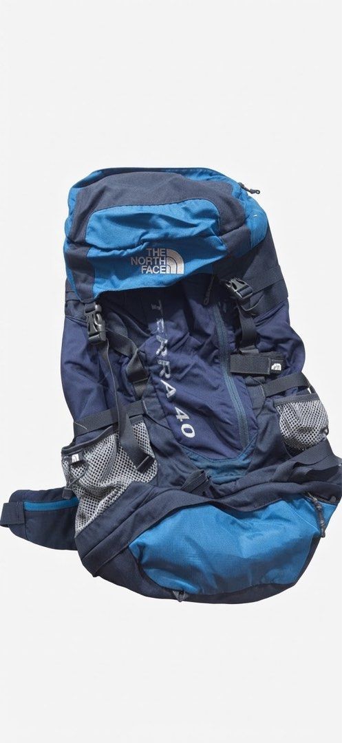 The North Face Terra 40 Backpack (Category: Backpacks) located in Bacolod City. Submitted by purrfectfit (Listing ID 1466315196, Image 1). Description: - Authentic The North Face Terra 40 backpack in Blue/Navy - Generous 40L capacity with multiple compartments and secure zip closures - Features adjustable straps and convenient mesh side pockets for water bottles - Ideal for hiking, camping, weekend trips, or daily commuting - Condition: Good func