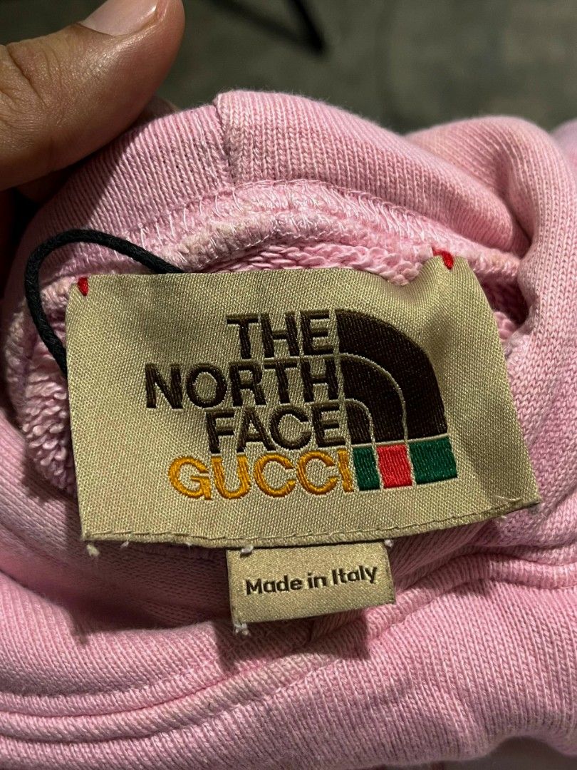 THE NORTH FACE X GUCCI PULLOVER HOODIE (Category: Coats, Jackets and Outerwear) located in Davao. Submitted by nmd.archives (Listing ID 1466183909, Image 2). Description: Small on tag 23 x 25 (fits large to XL) Color rate and condition: 9.8/10 Issue: missing lace, washable stains sa may pocket banda.