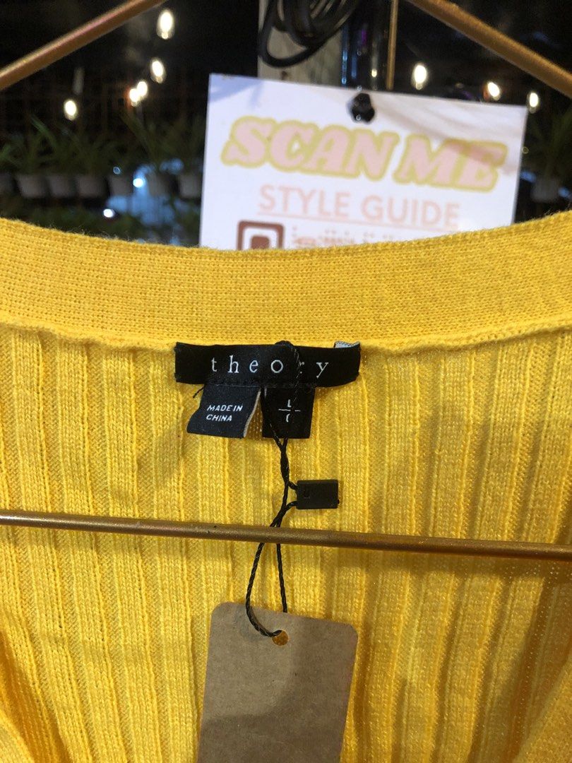 Theory Yellow Ribbed Knit V-Neck Cardigan (Category: Coats, Jackets and Outerwear) located in Cauayan City . Submitted by wholly.craaaft (Listing ID 1466190879, Image 2). Description: - Brand: Theory - Size: L (Tag still attached with original price tag) - Color: Bright yellow - Material: Clean ribbed knit - Design: V-neckline with 4 dark front buttons and long sleeves - Condition: Brand new, never worn - Origin: Made in China.