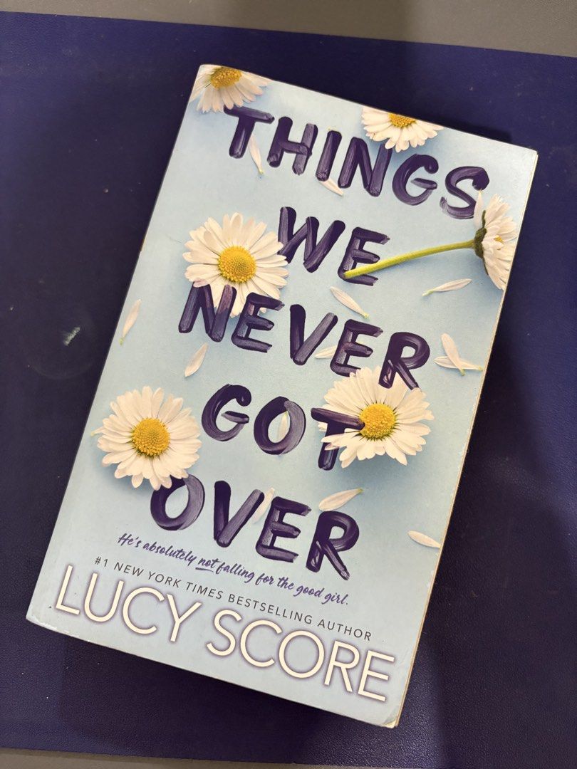 Things We Never Got Over by Lucy Score paperback (Category: Storybooks) located in Pasig City. Submitted by munchinitajanella (Listing ID 1466271861, Image 1). Description: - Title: Things We Never Got Over by Lucy Score - Series: Book 1 in the Knockemout series - Format: Paperback edition by Bloom Books - Condition: brand new, clean pages, minor shelf wear on edges - Perfect for: Romance lovers and great as a beach read.