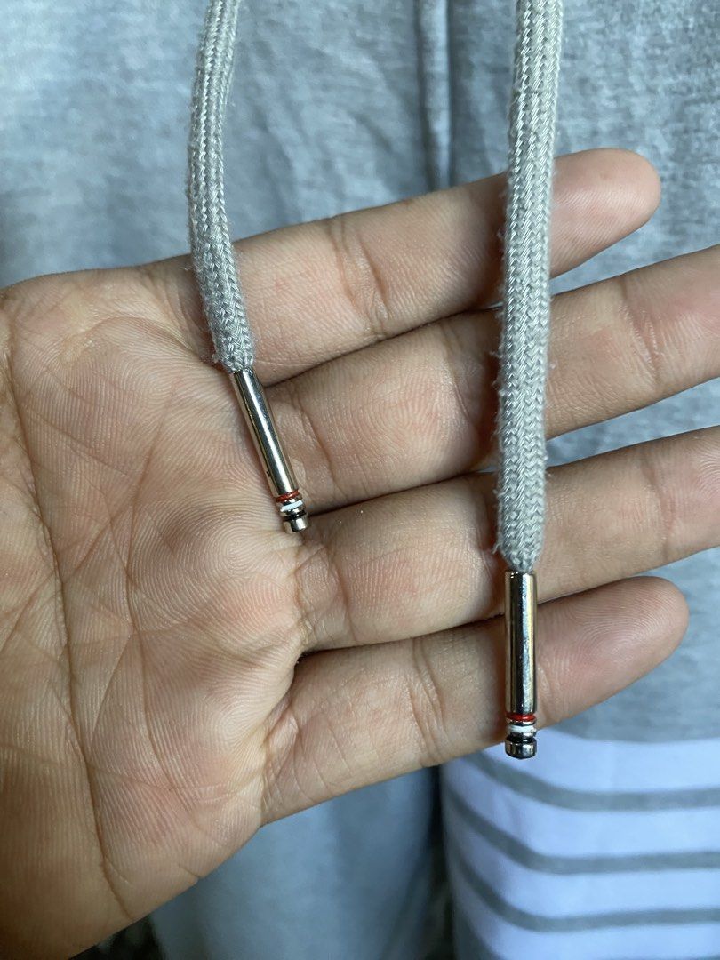 Thom Browne New York Grey Sweatpants Size 2 (Category: Joggers) located in San Fernando. Submitted by thrifteezy6 (Listing ID 1466204196, Image 3). Description: - Brand: Thom Browne New York - Size: 2 (Made in Japan) - Color: Grey with signature white 4-bar stripes on the left leg - Material: Premium fleece for ultimate daily comfort - Details: Drawstring waist with silver hardware, woven lower leg size tag, and iconic red, white, and blue grosgr