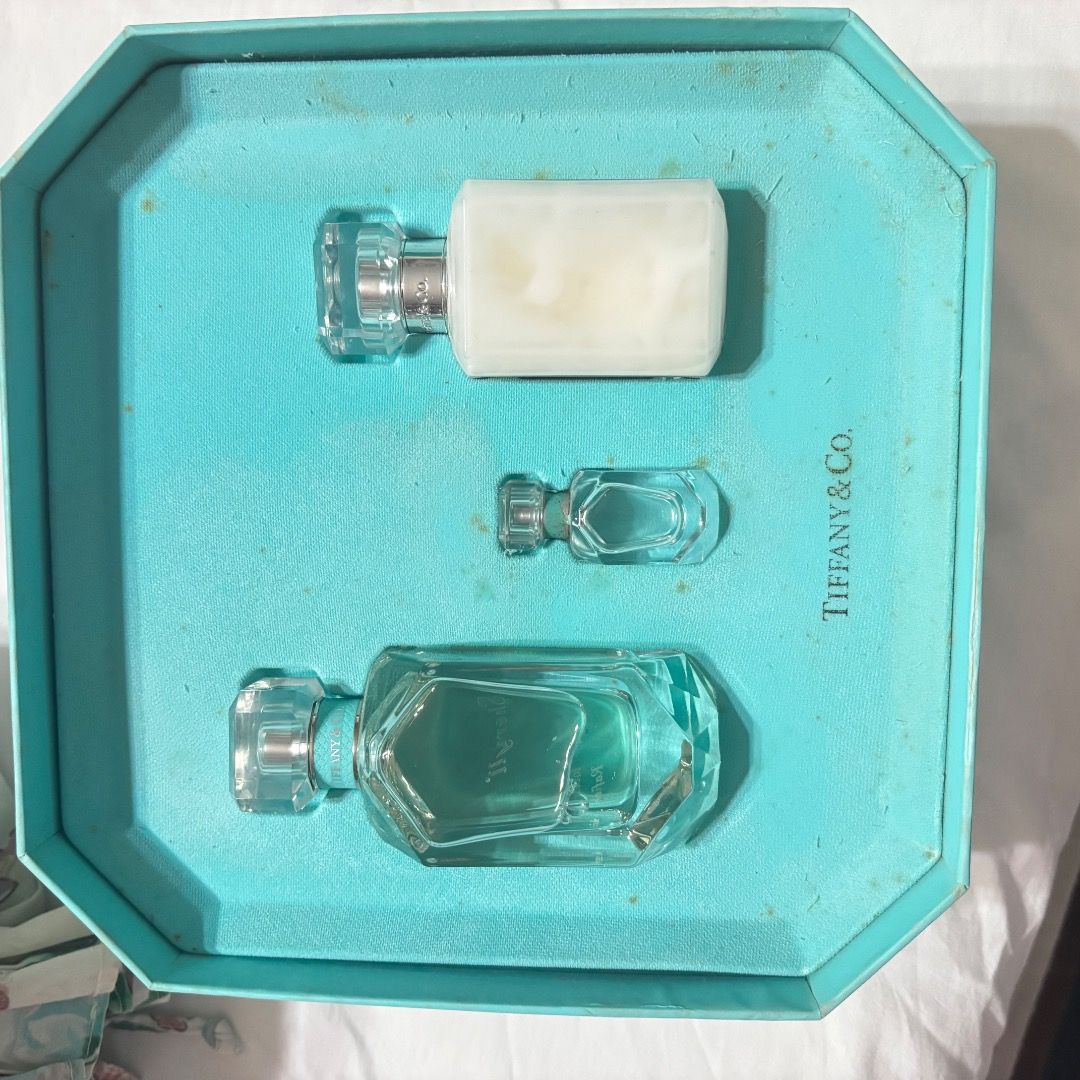 Tiffany & Co Perfume Gift Set (Category: Fragrance & Deodorants) located in Caloocan City. Submitted by crateandbarrel (Listing ID 1466320159, Image 1). Description: - Authentic Tiffany & Co. Classic Fragrance Gift Set - Includes: Large perfume spray, travel-size spray, and scented body lotion - Iconic collectible packaging: Stunning robin egg blue box shaped like a diamond cut - Perfect for gifting, traveling, or as a collector's item - Brand ne