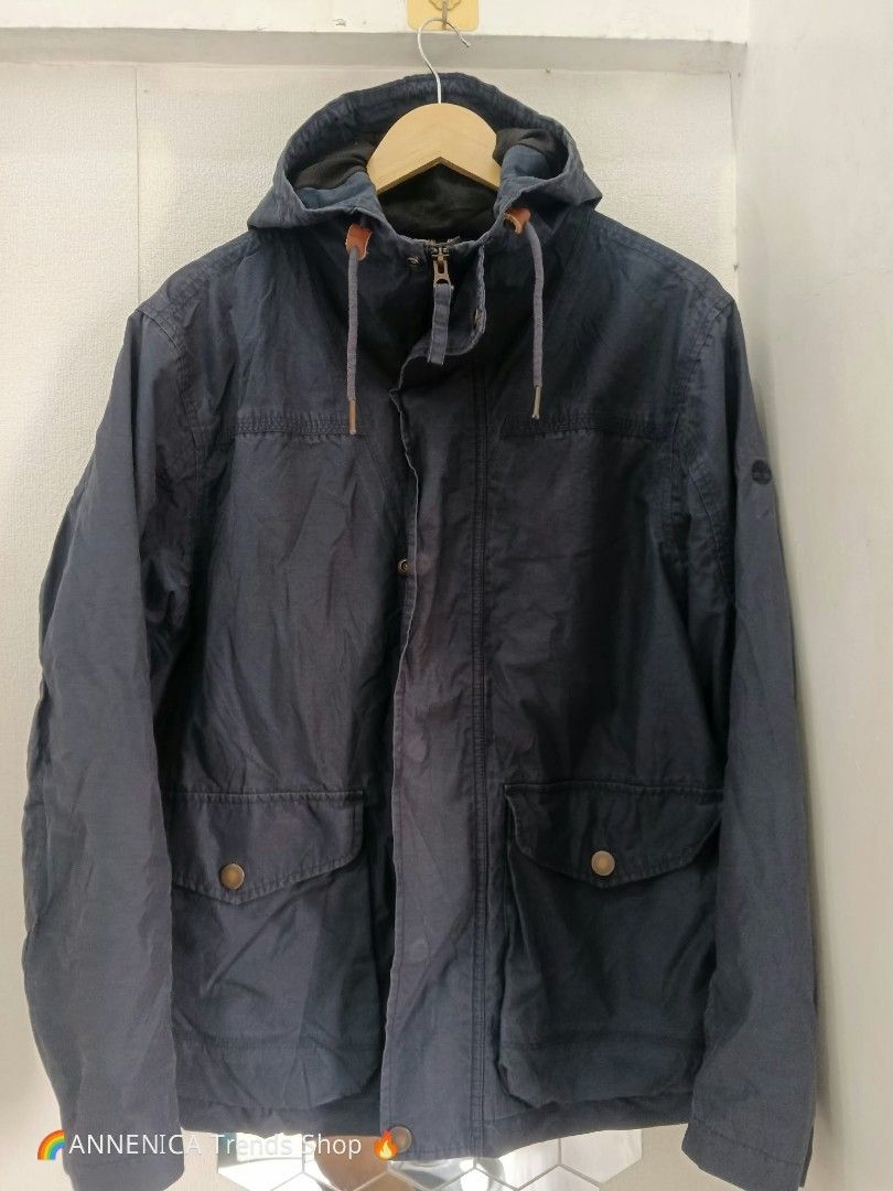 Timberland Jacket (Category: Coats, Jackets and Outerwear) located in Bulacan. Submitted by ukaybrandedshop (Listing ID 1466195911, Image 1). Description: TIMBERLAND WATERPROOF PARKA JACKET 🌲💧 Brand: Timberland Waterproof (Legit) Size: L on tag - Large Color: Dark Navy Blue Condition: Excellent, No issue, Good as new! ✅ Waterproof / Pang ulan & lamig ✅ With Hoodie + Drawstring ✅ Makapal at Heavy Duty ✅ Pang porma, pang motor, pang Japan! Mine n