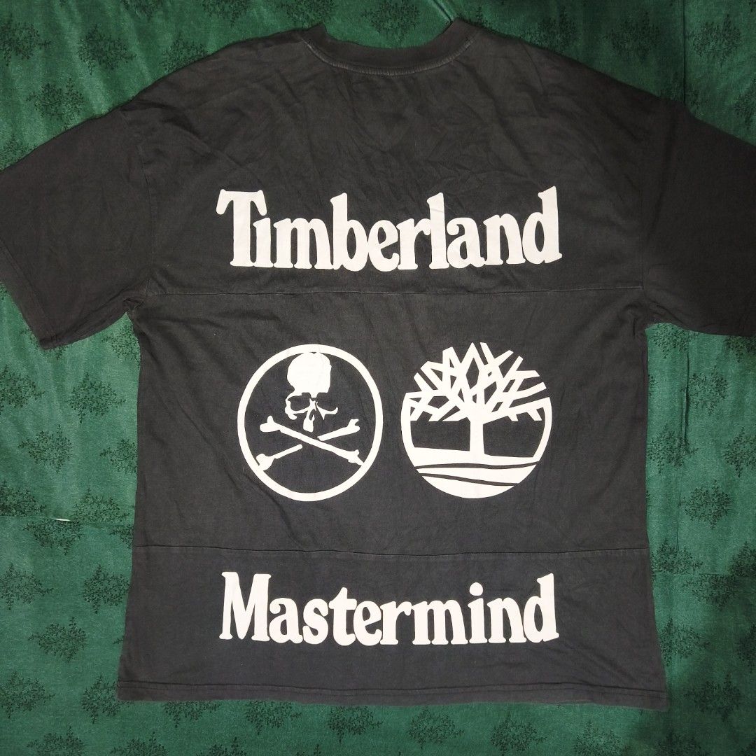 Timberland x Mastermind Black T-shirt (Category: Tshirts & Polo Shirts ) located in Antipolo. Submitted by alphaomega_fox (Listing ID 1466254953, Image 1). Description: - Authentic Timberland x Mastermind collaboration t-shirt - size 23x29 - Color: Worn-in vintage black wash - Fit: Regular fit, crew neck - Details: Small dual brand logo on chest - Back Graphic: Large Timberland text with iconic Mastermind skull & crossbones - Material: Comfortabl