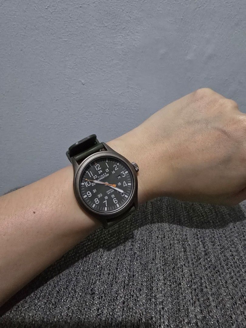 Timex Expedition Rugged Watch Olive Green Strap (Category: Men's Watches) located in Manila. Submitted by dunnohihi (Listing ID 1466268031, Image 1). Description: - Brand: Timex Expedition - Movement: Reliable quartz with working battery included - Design: Round metal case with military dial (12 & 24-hour markers) - Strap: Dark green perforated rubber strap with standard buckle - Special Features: Indiglo night-light & 50M water resistance - Cond