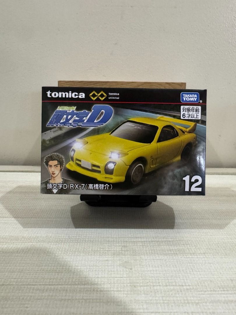 Tomica Premium Initial D Mazda RX-7 (Category: Vehicle & Diecast Models) located in Pasig City. Submitted by zanderlouie24 (Listing ID 1466183444, Image 1). Description: Tomica Premium Initial D Mazda RX-7 +Shipping fee: Lalamove kung within Metro Manila and LBC pag outside Metro Manila .