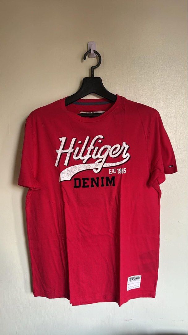 Tommy Hilfiger (Category: Tshirts & Polo Shirts ) located in Manila. Submitted by heiheiha04 (Listing ID 1466274026, Image 1). Description: Tommy Hilfiger Shirt (Pink red) Fit to medium Condition: 8/10 ₱ 150 Dimension: Width: 20.5 inches Length: 27 inches.