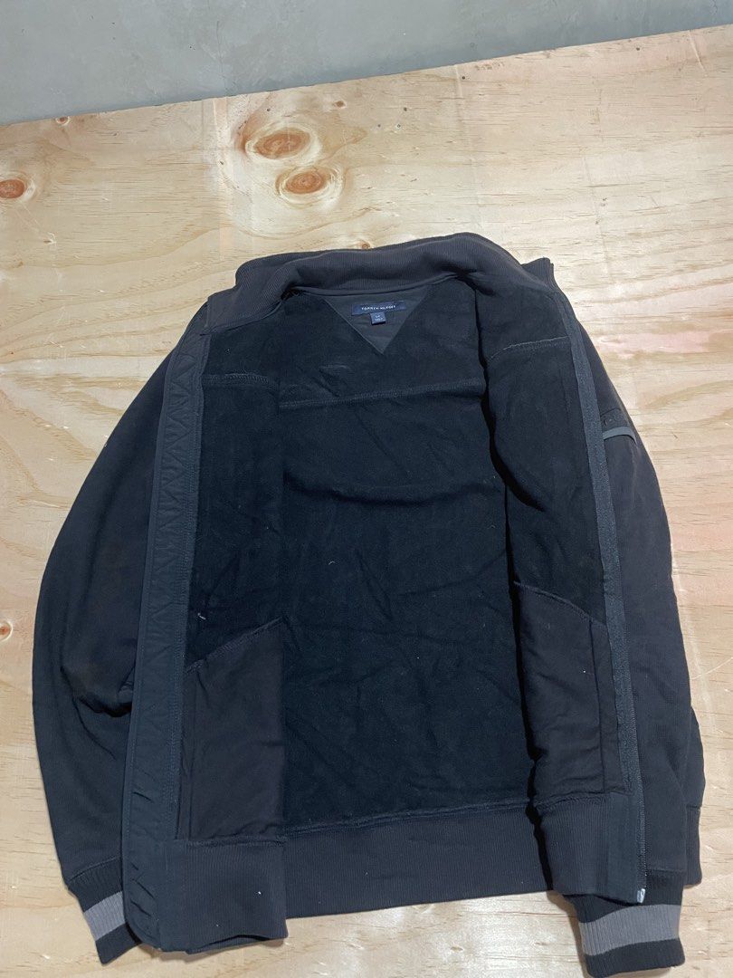 Tommy Hilfiger Black Zip Up Jacket Size S (Category: Coats, Jackets and Outerwear) located in Zamboanga. Submitted by guthens (Listing ID 1466308209, Image 3). Description: Condition- excellent Measurement- W- 21 L- 27 Issue- stain Color rate- 9.7/10 Wash already .