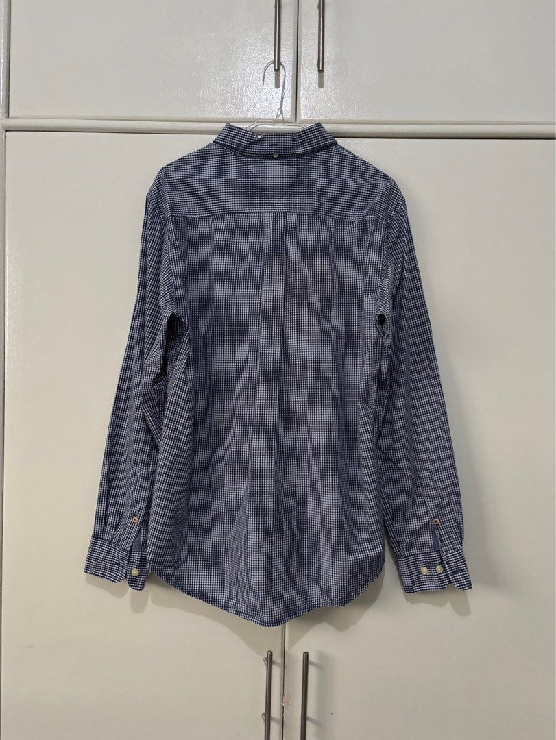 TOMMY HILFIGER MEN’S GINGHAM LONG SLEEVE BUTTON-DOWN SHIRT (Category: Tshirts & Polo Shirts ) located in Bulacan. Submitted by kennyfindss (Listing ID 1466271641, Image 2). Description: TOMMY HILFIGER MEN’S GINGHAM LONG SLEEVE BUTTON-DOWN SHIRT Size on Tag: Medium W: 20–21” L Front: 29” L Back: 31” Sleeves: 26” Color Rate: 10/10 Condition: Good Condition Issues: None Fabric/Material: Cotton Sourced from: USA DM TO PURCHASE .