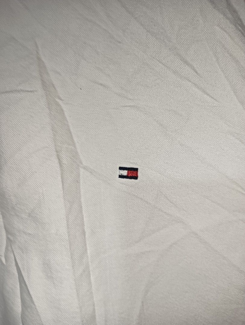 Tommy Hilfiger White Custom Fit Button-Down Shirt (Category: Tshirts & Polo Shirts ) located in Taguig. Submitted by dandanathriftshop (Listing ID 1466270095, Image 2). Description: FORSALE ‼️ TOMMY OXFORD WHITE EXCELLENT CONDITION NO ISSUE MEDUIM ON TAG 21.5 WIDTH 28 LENGTH 799 FREESHIPPING DM 📥.