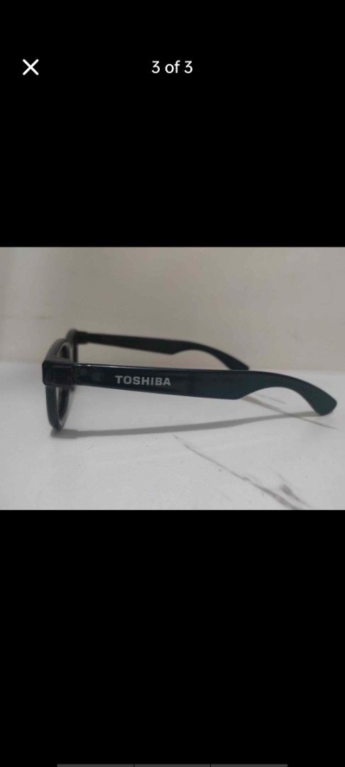 Toshiba 3D Glasses (Category: Virtual Reality) located in Manila. Submitted by billythekid05 (Listing ID 1466285063, Image 3). Description: - Brand: Toshiba - Item: Bundle of black 3D glasses - Material: Sturdy plastic frames with clear lenses - Ideal for: Movie nights on compatible 3D TVs - Availability: Multiple pairs in this lot - Fulfillment: Open for meetup or shipping options.