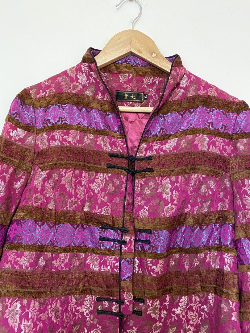 Traditional Chinese Style Patterned Mandarin Collar Jacket (Category: Coats, Jackets and Outerwear) located in Makati City. Submitted by bottega_boi (Listing ID 1466253675, Image 3). Description: - Style: Chinese-style mandarin collar jacket - Color/Design: Pink with brown velvet, purple patterned stripes, and vibrant metallic threading - Details: Traditional frog knot closures down the front, long sleeves - Size: XL - Fit/Material: Lightweight s