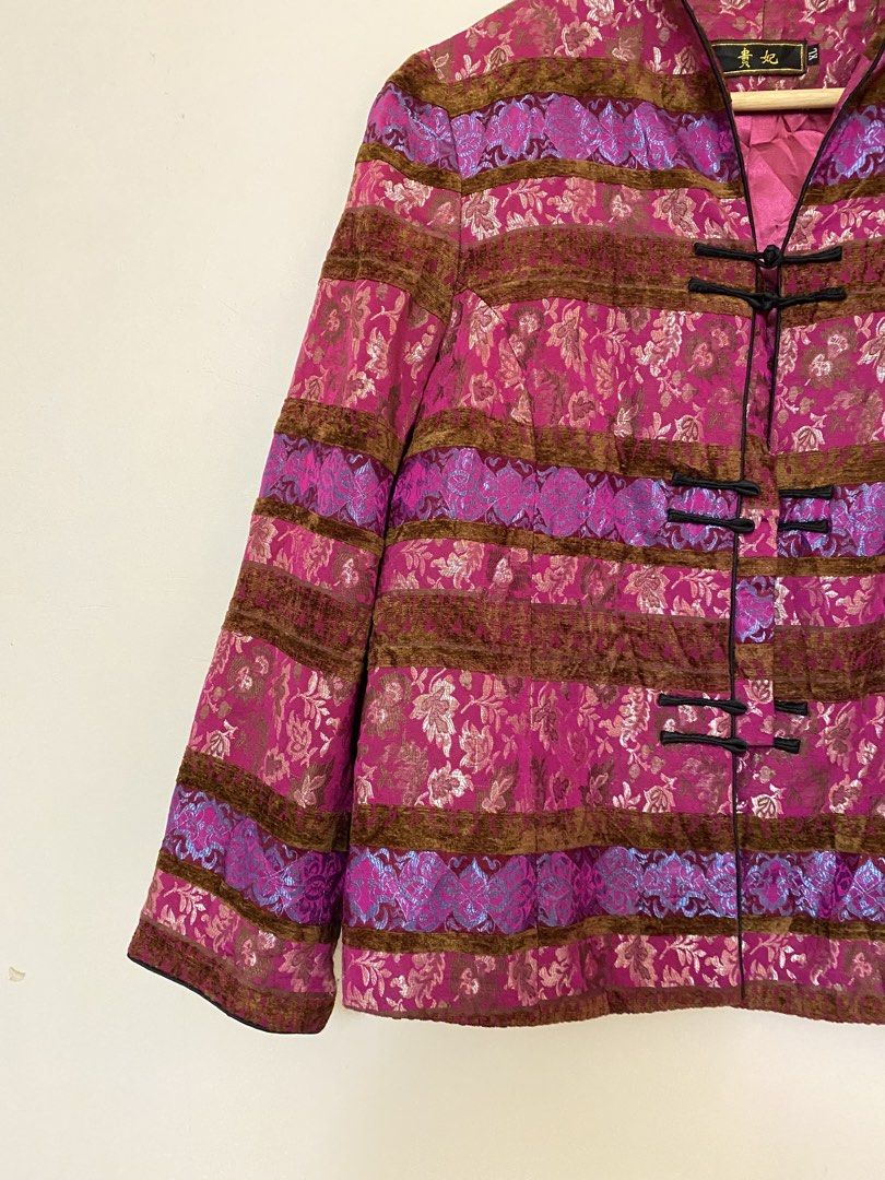 Traditional Chinese Style Patterned Mandarin Collar Jacket (Category: Coats, Jackets and Outerwear) located in Makati City. Submitted by bottega_boi (Listing ID 1466253675, Image 2). Description: - Style: Chinese-style mandarin collar jacket - Color/Design: Pink with brown velvet, purple patterned stripes, and vibrant metallic threading - Details: Traditional frog knot closures down the front, long sleeves - Size: XL - Fit/Material: Lightweight s