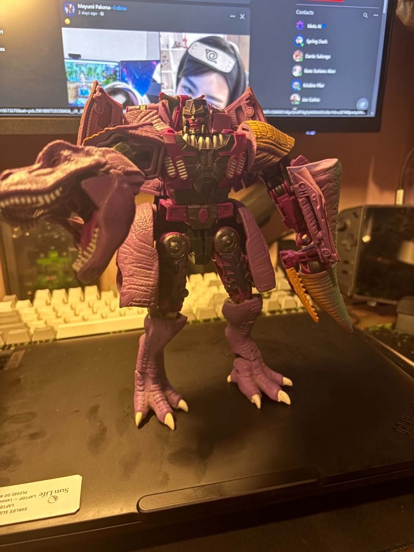 Transformers Kingdom War For Cybertron Megatron (Beast) (Category: Action & Battle Toys) located in Taguig. Submitted by livehorse.8cf1df (Listing ID 1466295378, Image 1). Description: - Purple and green Beast Wars Megatron action figure - Converts smoothly between robot and T-Rex modes - Fully articulated joints for dynamic posing - Clean paint with minimal wear - Stands securely on its own in both modes - Perfect collectible piece for Transform