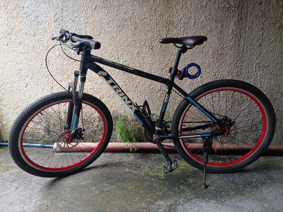 Trinx Mountain Bike take-all (Category: Bicycles) located in Las Pinas. Submitted by fiercefish_a3b544 (Listing ID 1466156774, Image 1). Description: take-all Trinx mountain bike (26er) - 3x9 speed - bago shifters, RD at mga kable - Tanke hubs (tunog mayaman) issue : rust on some parts (natural sa 2nd hand unit) batalya 26er repaint na (kyo na mgpaganda) with seat post & saddle playable suspension fork wheelset - with 9 speed cogs and some stock 