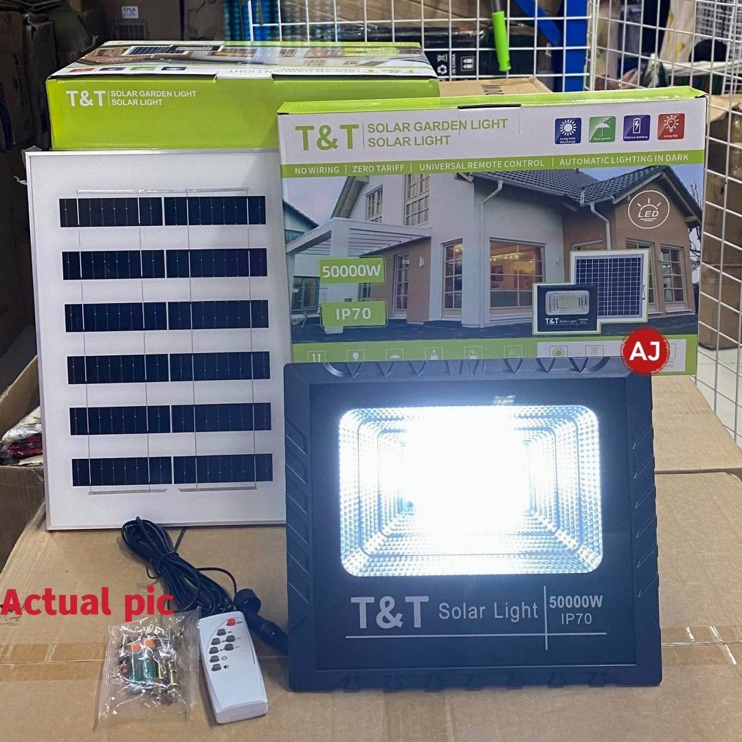 T&T 50000W Solar Garden Light with Remote (Category: Lighting) located in Manila. Submitted by iliasjen3082126 (Listing ID 1466205646, Image 2). Description: T&T 50000W solar garden light and flood light. IP70 waterproof rating. Zero electricity tariff required, completely wireless setup. Automatic lighting turns on in the dark. Includes solar panel, LED light fixture, remote control, mounting bracket, and hardware bag. Original box included..