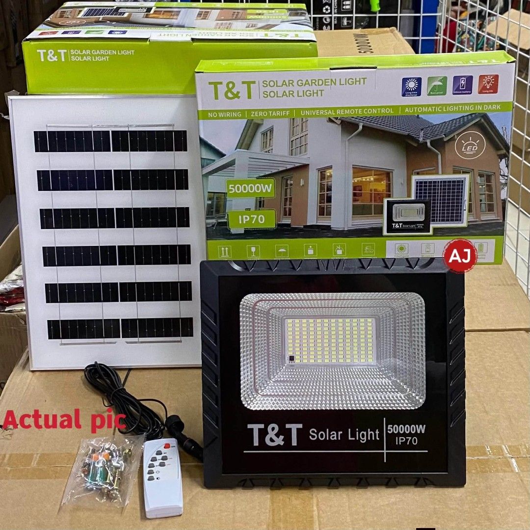 T&T 50000W Solar Garden Light with Remote (Category: Lighting) located in Manila. Submitted by iliasjen3082126 (Listing ID 1466205646, Image 1). Description: T&T 50000W solar garden light and flood light. IP70 waterproof rating. Zero electricity tariff required, completely wireless setup. Automatic lighting turns on in the dark. Includes solar panel, LED light fixture, remote control, mounting bracket, and hardware bag. Original box included..