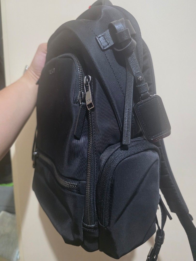 TUMI Voyageur Celina Medium Backpack -Black/gunmetal hardware (Category: Backpacks) located in Nasugbu. Submitted by khael77 (Listing ID 1466327529, Image 3). Description: Selling because my dad won this at a casino. It's brand new and unused, but I don't really have a use for it since I'm a guy. Original SRP based on my research is 34k to 36k so this is a steal. - Brand: TUMI -Collection: Voyageur -Model: Celina Medium Backpack -Style: 154168-T5