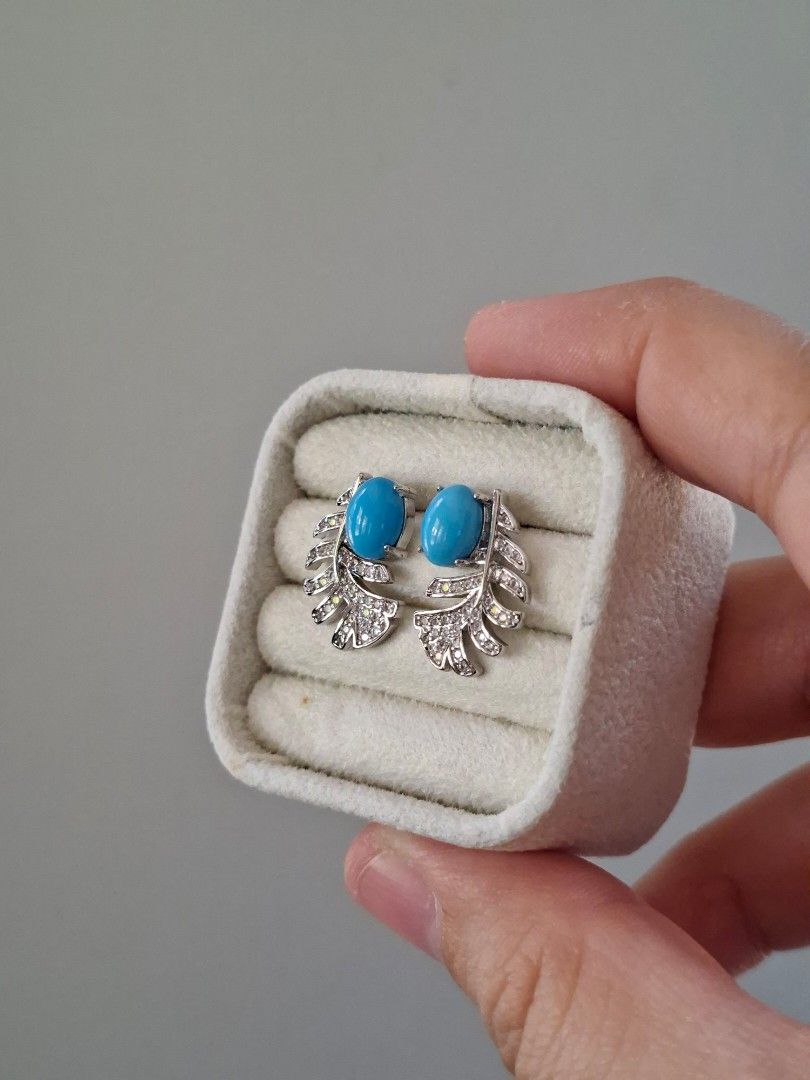 Turquoise Stone in Silver Feather Earrings (Category: Earrings) located in Dasmarinas. Submitted by danabrie22 (Listing ID 1466206615, Image 2). Description: very well-made, excellent crafstmanship 10/10 condition brand new stainless steel & turquoise -colored stone made in Hongkong.