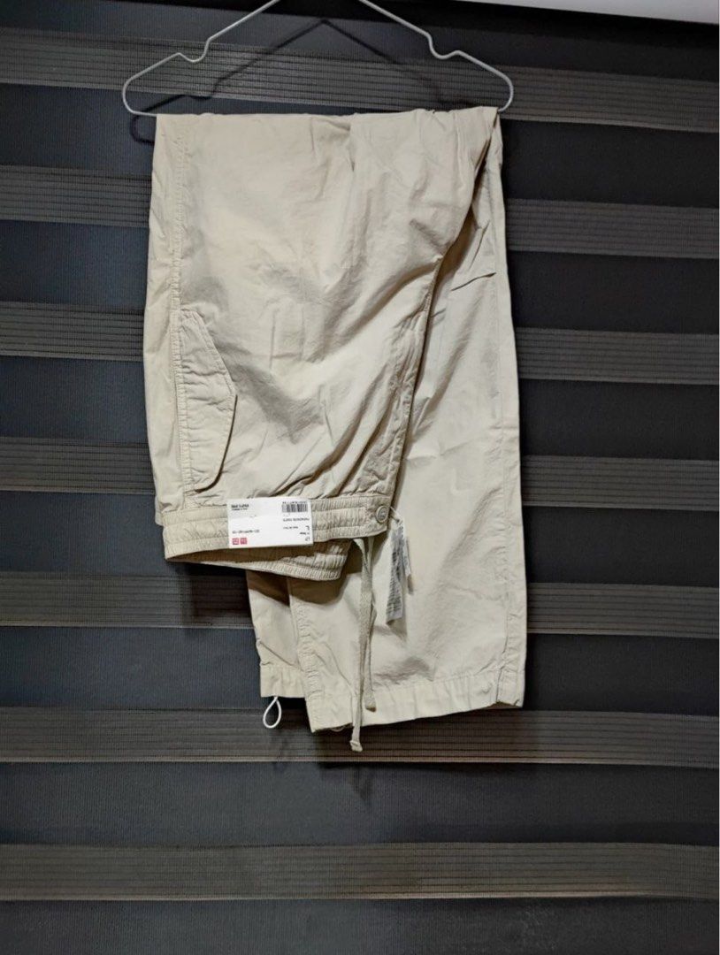 Uniqlo Parachute Cargo Pants Beige with Drawstring (Category: Trousers) located in Pasig City. Submitted by abogadosupremo (Listing ID 1466197488, Image 1). Description: Uniqlo Parachute Cargo Pants Beige Brand New - Uniqlo Parachute Pants in a Beige colour. -The pants have a relaxed fit and appear to be made of a lightweight material. - Perfect for casual wear. - This is Brand new - Bought it around 1,990 But sell it at 990. Thank you. - THIS IS