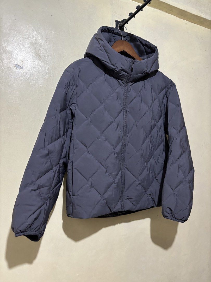 Uniqlo Pufftech (Category: Coats, Jackets and Outerwear) located in Taguig. Submitted by dcltrng. (Listing ID 1466259467, Image 3). Description: - Brand: Uniqlo - Item: Pufftech Jacket - Color: Dark Grey Size medium Length 24 Width 22 Can pass as brand new No issue.