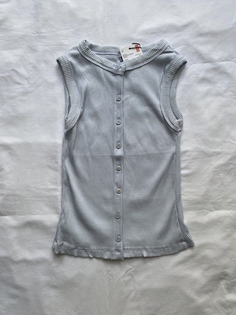 Uniqlo Ribbed Button-Front Sleeveless Top Light Grey (Category: Sleeveless) located in Valenzuela. Submitted by mandies_25 (Listing ID 1466280356, Image 1). Description: - Brand: Uniqlo - Style: Ribbed button-front sleeveless top - Color: Light grey - Condition: Brand new, unworn with original store tag intact - Features: Textured vertical ribbed fabric, center front buttons, cap sleeveless design with bound edges -Size: XS.