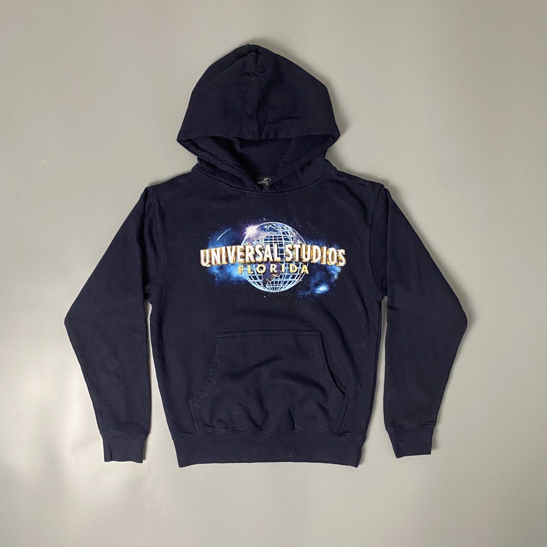 UNIVERSAL STUDIO ✨ | Black “Universal Studios” Pullover Hoodie (Category: Coats, Jackets and Outerwear) located in Bulacan. Submitted by orc.ph (Listing ID 1466264603, Image 1). Description: UNIVERSAL STUDIO ✨ | Black “Universal Studios” Pullover Hoodie Material Used: 80% Cotton 20% Polyester - Black -Hood -Kangaroo Pouch -Pullover -Merch -Casual -Streetwear -Ribbed Cuffs And Hem ‎-Size: S -Width: 18” ‎-Length: 22” ‎ ‎Pristine Condition. No Visib