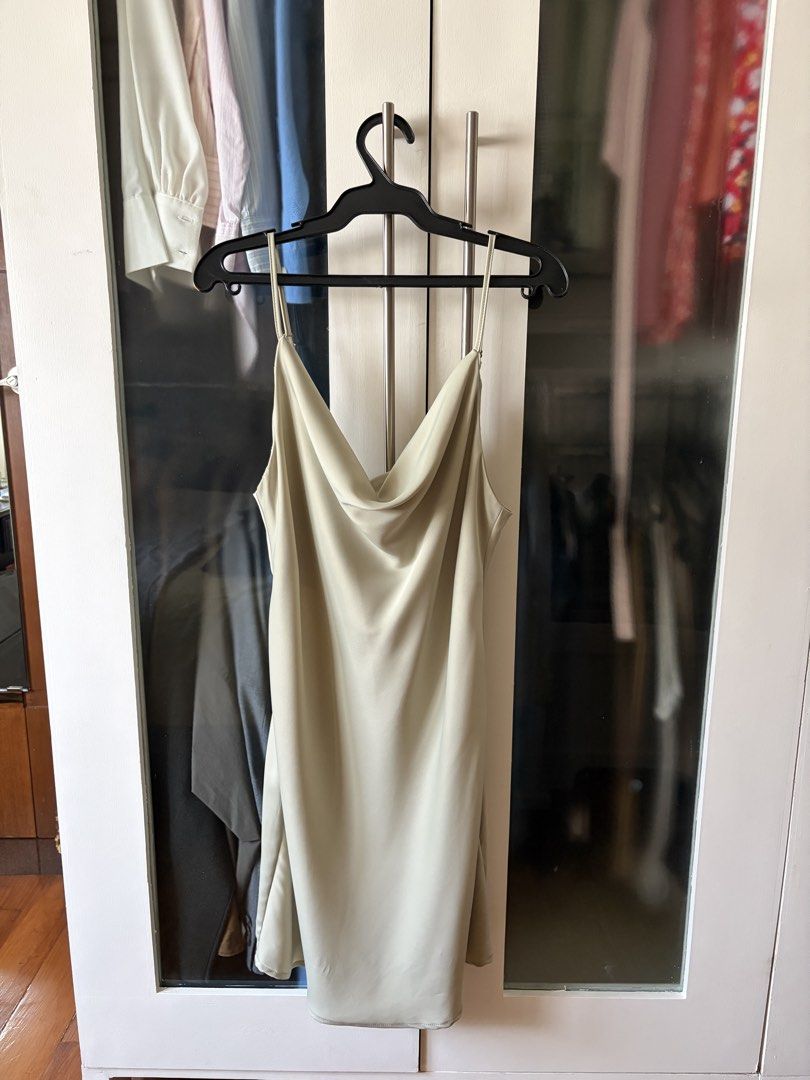 Urban Outfitters Dress (Category: Dresses) located in Quezon City. Submitted by ysabelmendoza (Listing ID 1466168212, Image 1). Description: Bought in the US! satin like finish. dress has a cowl neck for a flattering look.