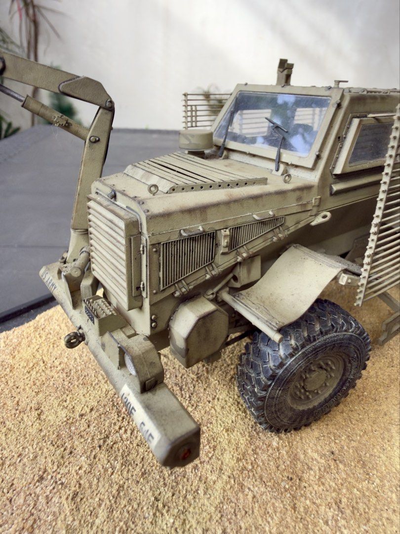 US Army Mine Resistant Ambush Protected Vehicle Model (Category: Vehicle & Diecast Models) located in Quezon City. Submitted by fazerecovery83 (Listing ID 1466233115, Image 1). Description: - Custom weathered US Army MRAP scale model in desert tan - Features realistic slat armor, crane attachment, and detailed desert diorama base - Fully loaded with accessories including M4 carbine, ammo boxes, and water bottles - Expertly applied weathering effe