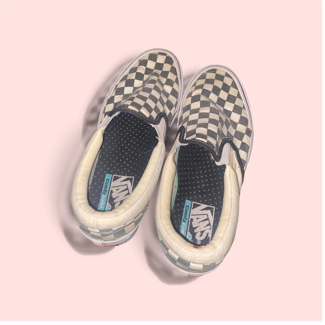 Vans ComfyCush Checkerboard Slip-On (Category: Sneakers) located in Rosario. Submitted by preloveditems2002 (Listing ID 1466244795, Image 1). Description: - Brand: Vans - Style: Checkerboard Slip-On - Comfort: Built with ComfyCush technology for extra cushioning - Material: Classic canvas upper with elastic side accents - Sole: Standard waffle grip tread - Condition: General signs of wear on the white rubber midsoles and collar fabric, still plen