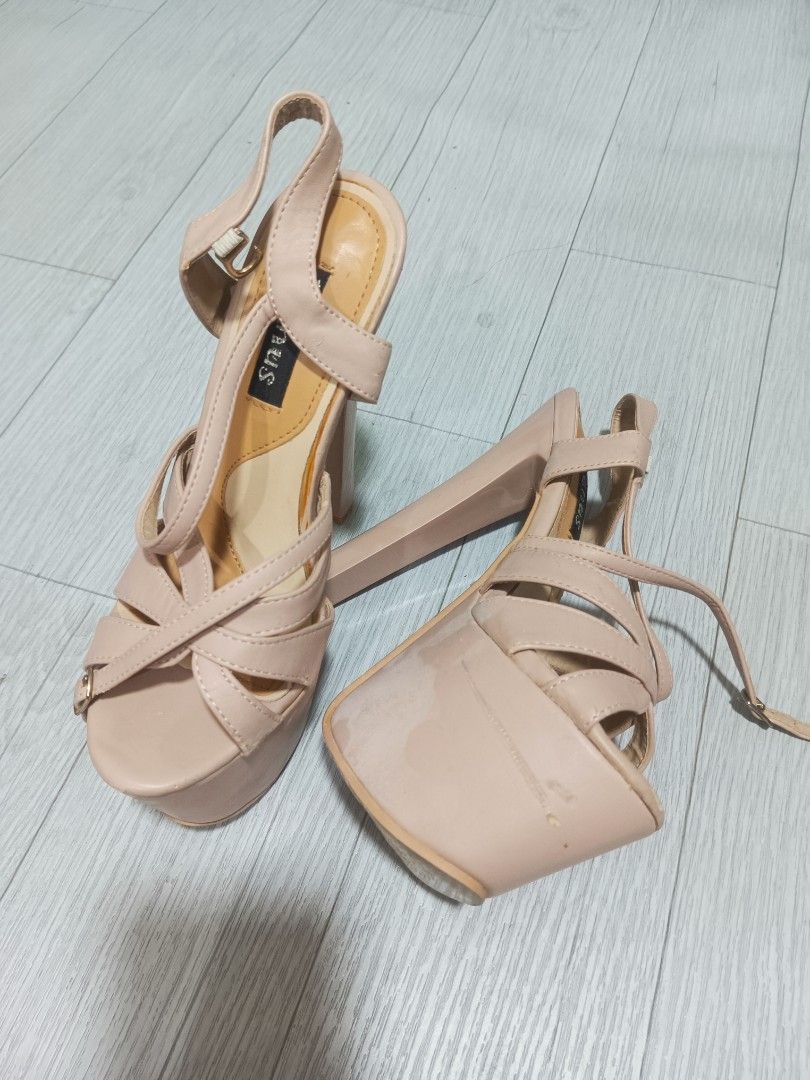 Venus Nude Platform Strappy High Heels (Category: Heels) located in Navotas City. Submitted by prelovedheelsandshoes (Listing ID 1466281035, Image 1). Description: - Brand: Venus - Style: Nude platform high heels with strappy criss-cross front and ankle strap with buckle closure - Heel: Chunky high block heel - Condition: Shows scuff marks, peeling, and wear on the platform and straps (check photos for issues) - size 35.
