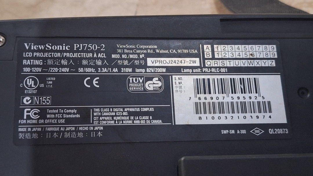 ViewSonic PJ750-2 LCD Projector (Category: Projectors) located in Angeles City. Submitted by pamdiel003 (Listing ID 1466201700, Image 2). Description: - Brand/Model: ViewSonic PJ750-2 LCD Projector - Color: Classic black plastic casing - Lens: Manual focus ring at the front - Controls: Easy-to-use top panel buttons (power, menu, keystone) - Power Compatibility: Supports 100-120V or 220-240V - Lamp Details: 310W lamp power, uses lamp unit PRJ-RLC-